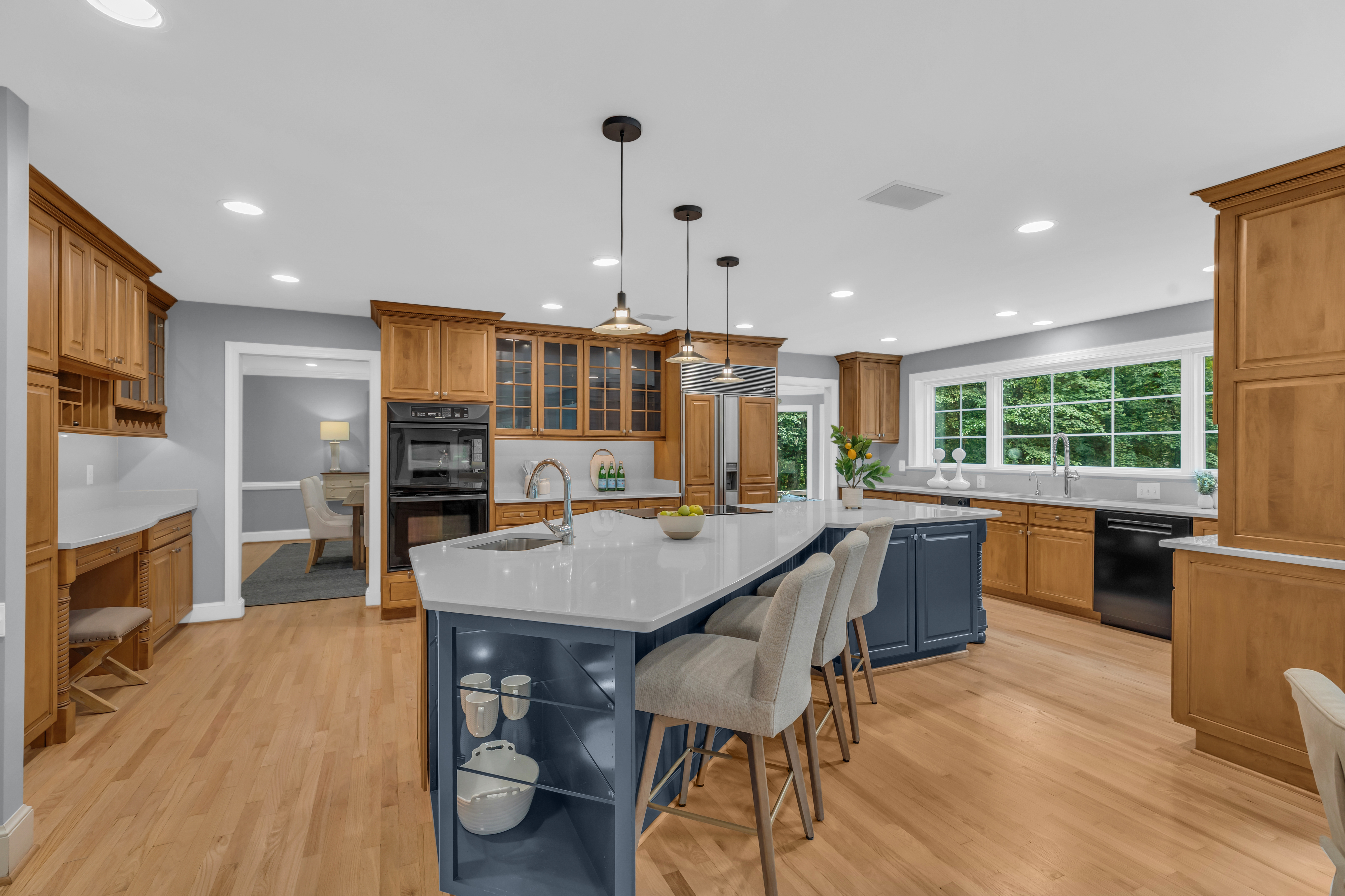 Wide-angle interior real estate photo of a luxury home kitchen in Fairfax Station, Virginia