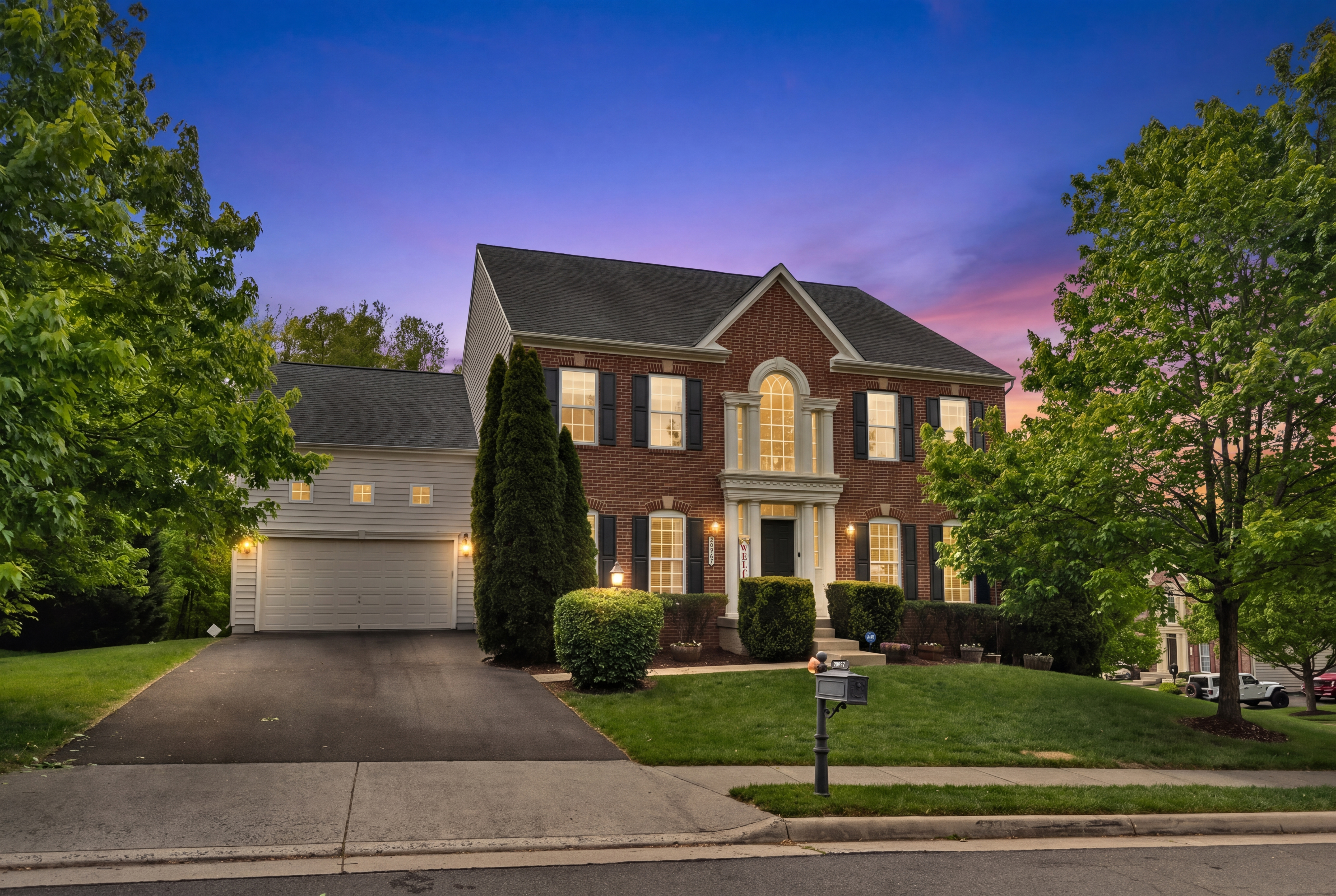 Twilight real estate photography of a spacious home in Leesburg, Virginia