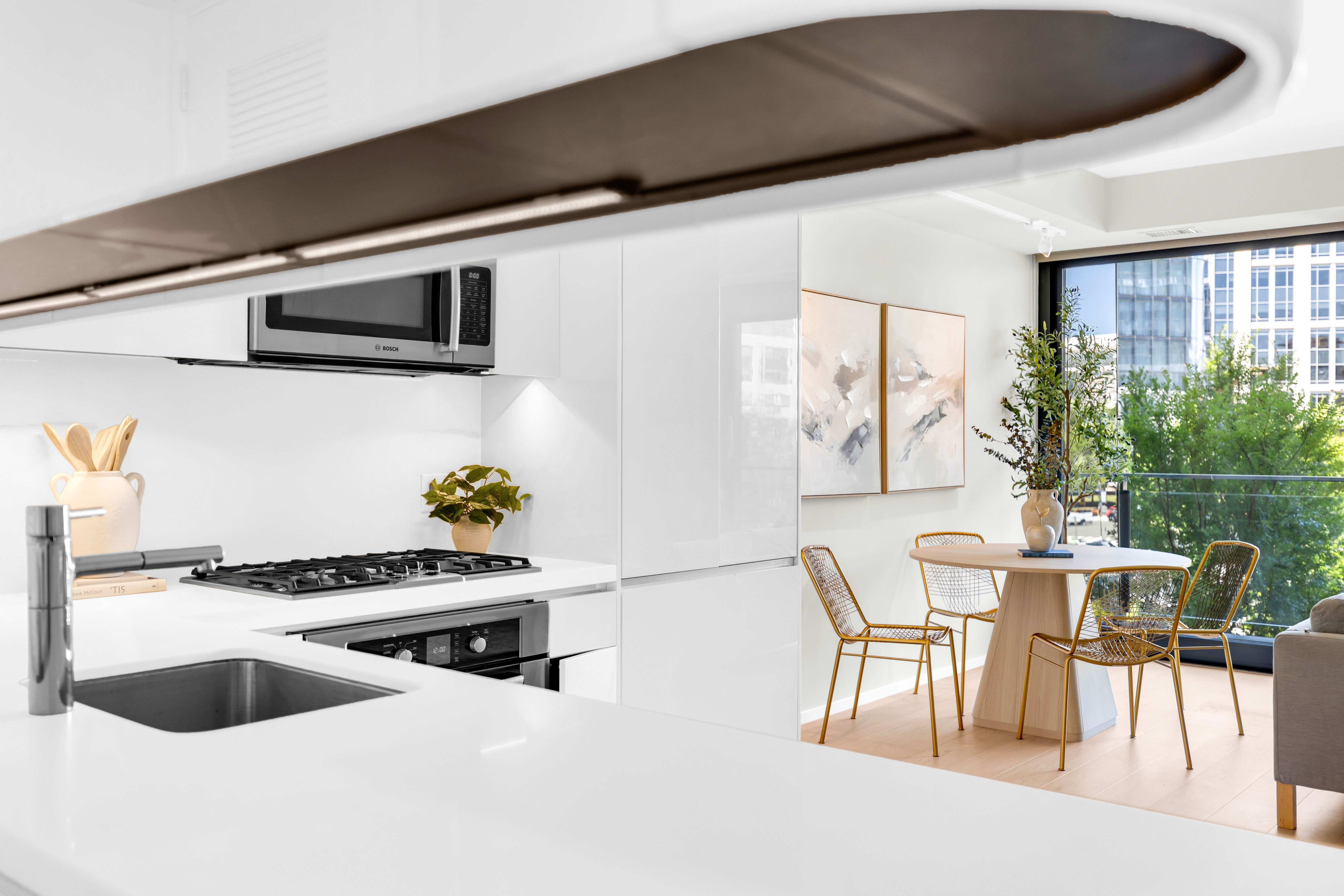 Home exterior photographed at twilight with warm interior lighting